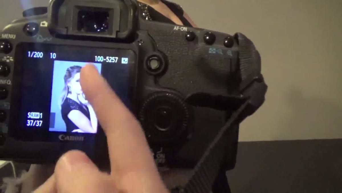 Beauty dish positioned to the side, shadow visible on far cheek