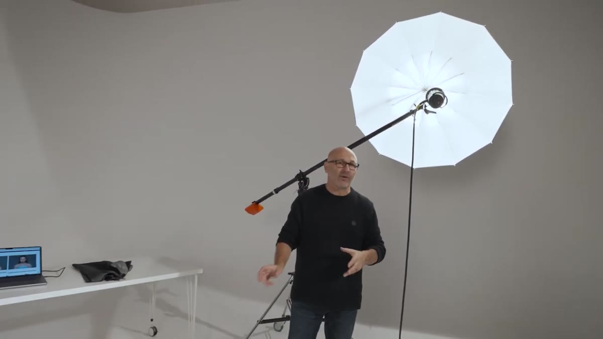 Interior of deep focus umbrella showing centrally brighter, even illumination