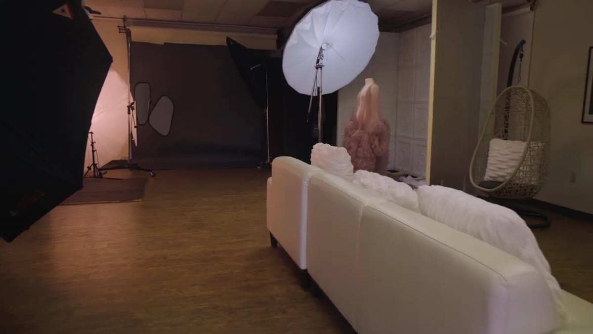 Open shooting space with multiple lighting setups visible