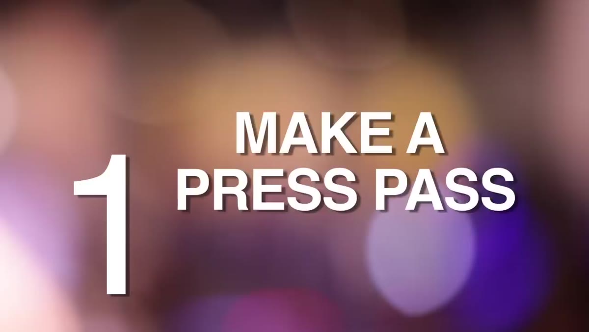 Laminated press pass with photo and company name