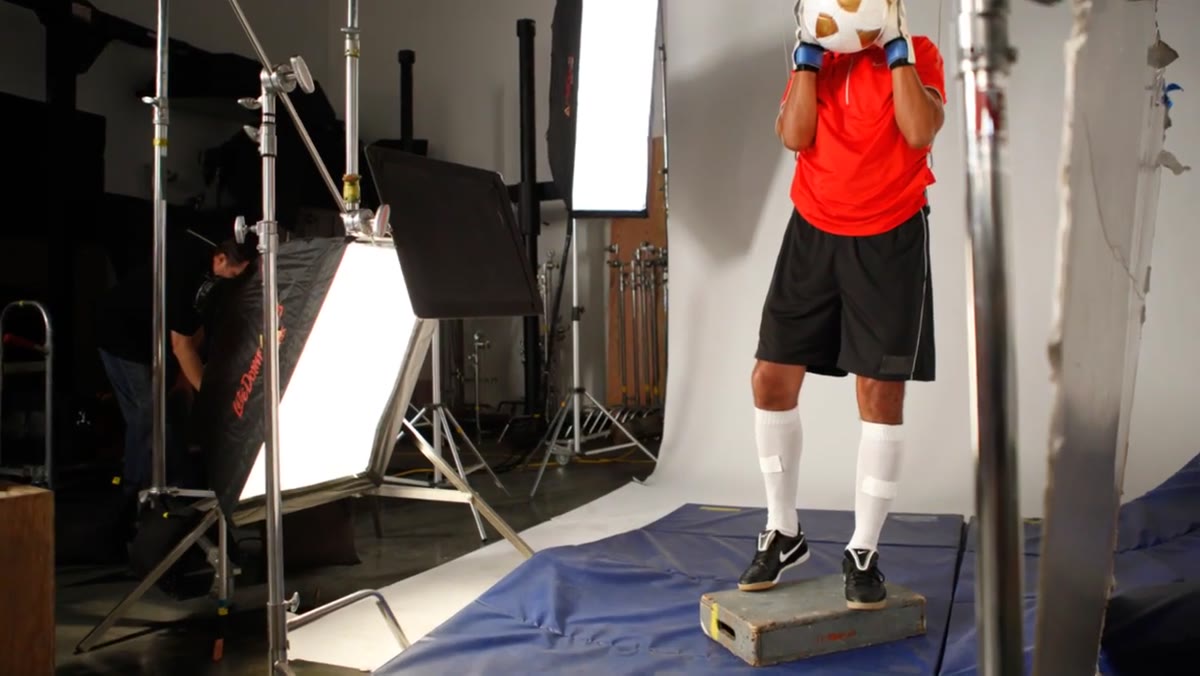 Medium softbox placed low and flagged for the legs
