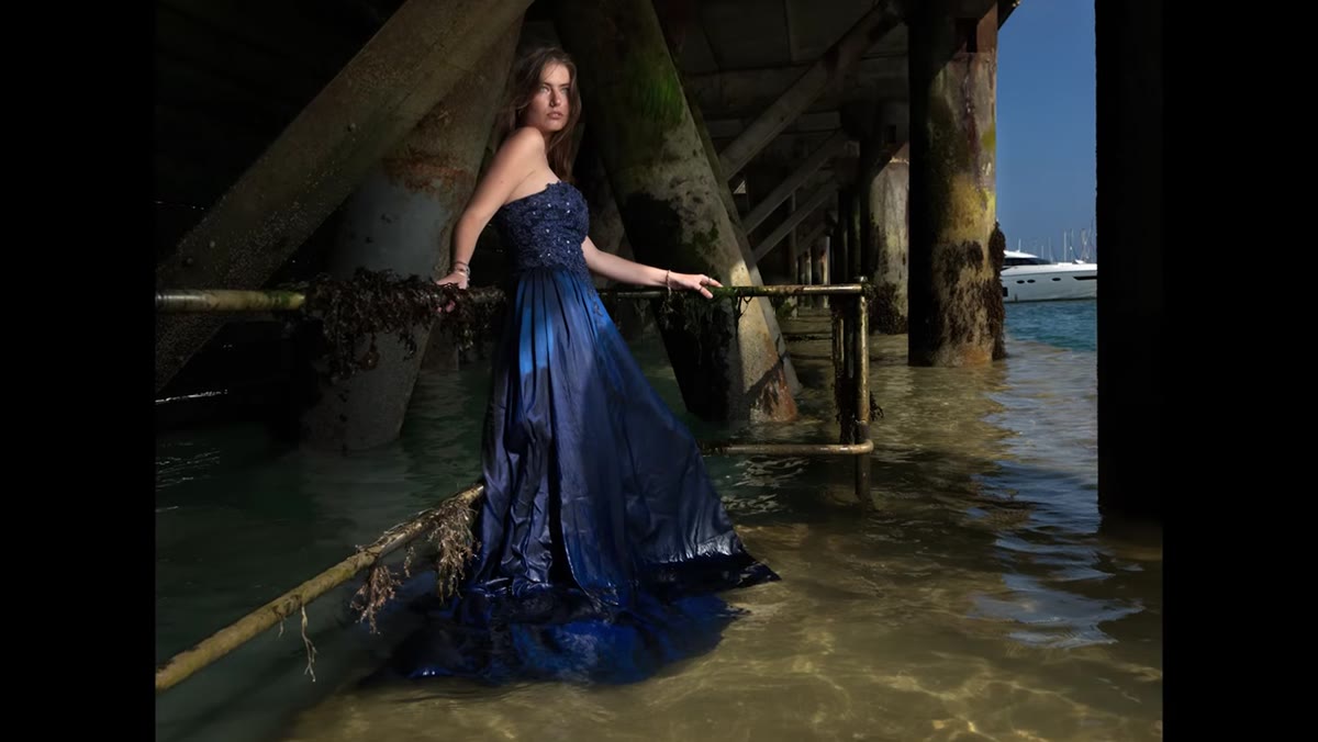 Photographer reviewing image, checking subject exposure against background