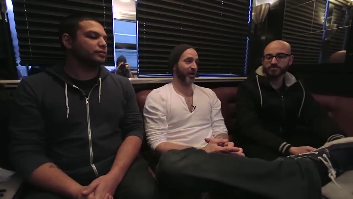 Band members discussing the intention behind their record