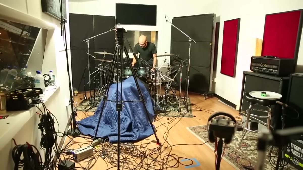 Discussion of the multi-week drum tracking process at Oceanic Recording