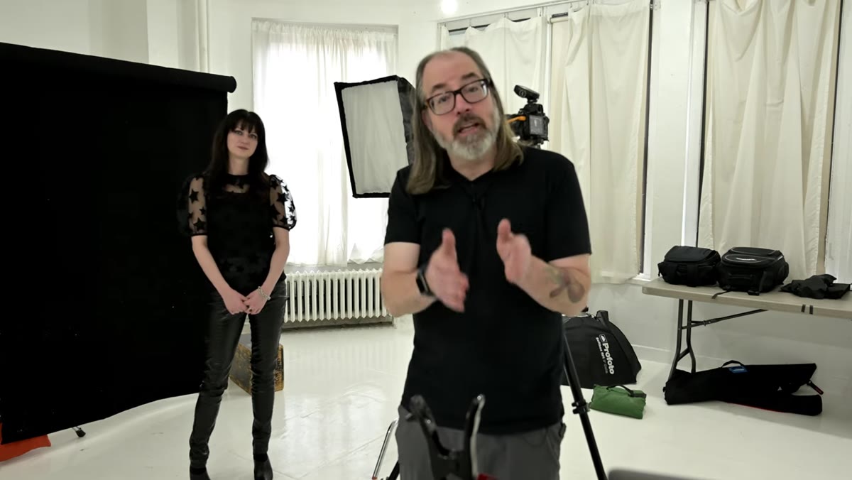 Daniel explaining short lighting with subject facing away from camera