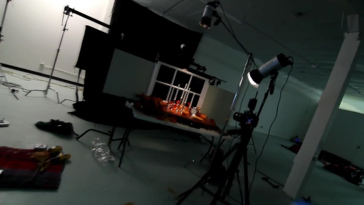 Candelabras and clock arranged on a table in studio