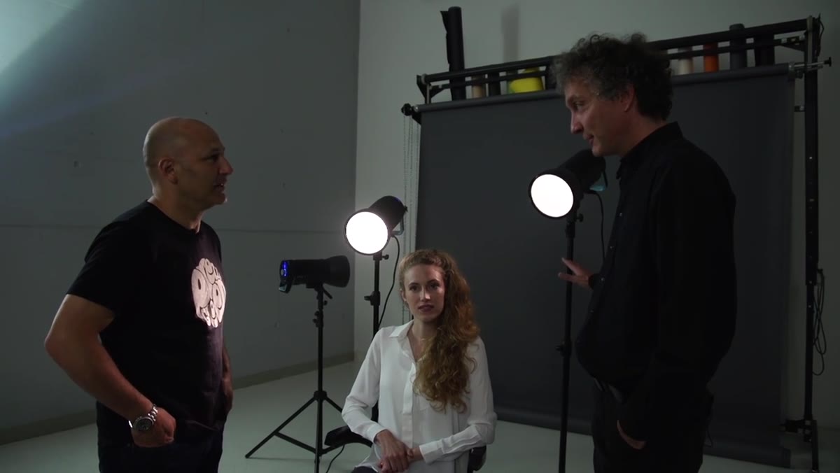 Photographer explaining the backlight-only setup concept