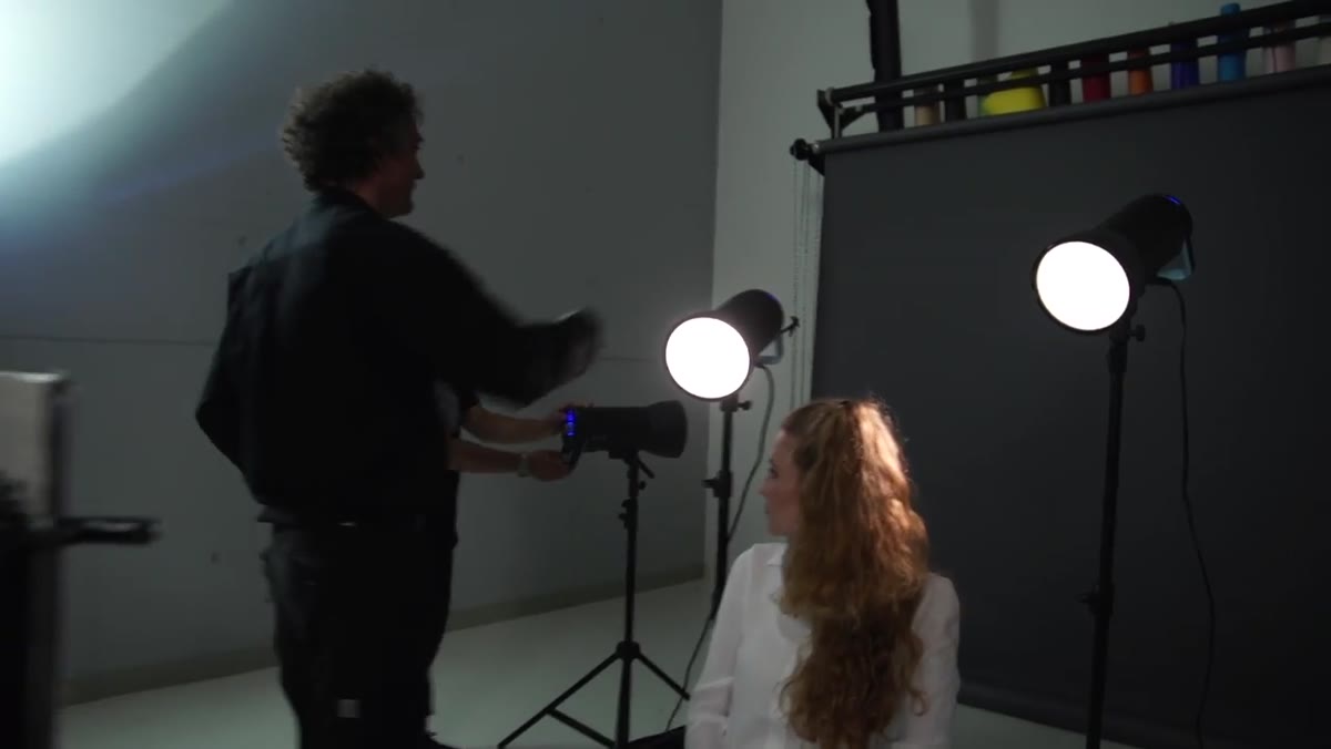 Background light with honeycomb grid on dark backdrop