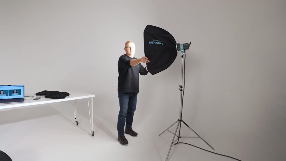 Modifier positioned close to wall showing tight, controlled light spread