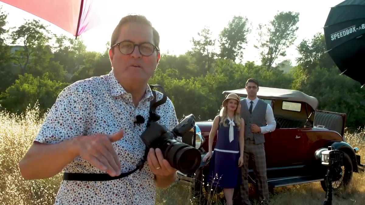 Scene shifting to lower ambient light, subjects repositioned near car