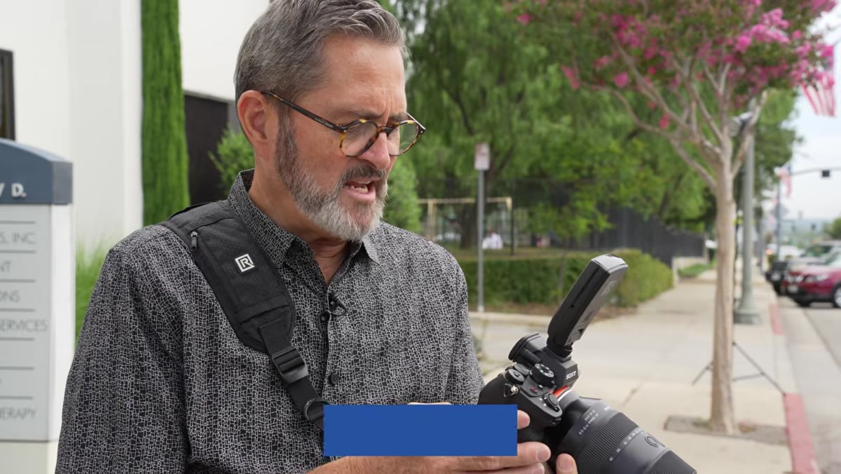 Camera settings adjustment, aperture being set around f/5.6