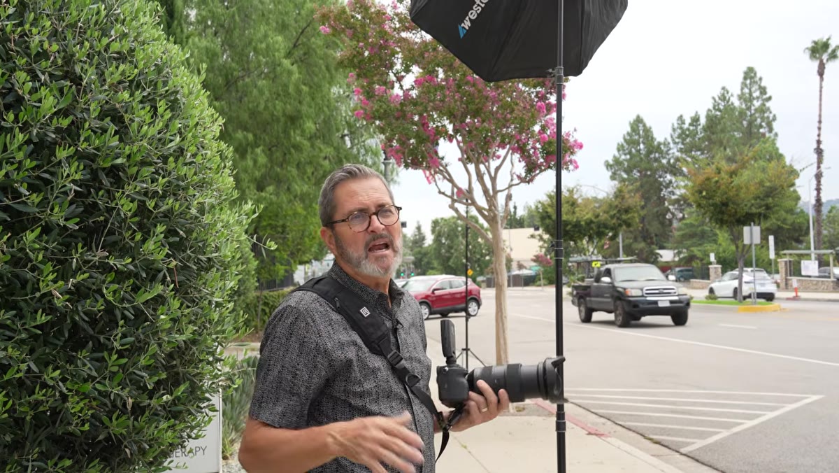 Jay adjusting shutter speed to reduce ambient exposure