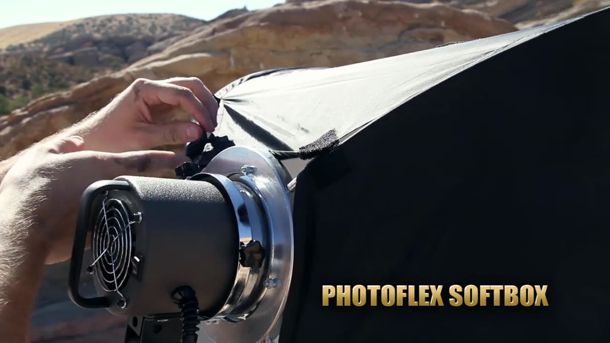 Dyna-lite travel head with large Photoflex softbox positioned on subject&rsquo;s face