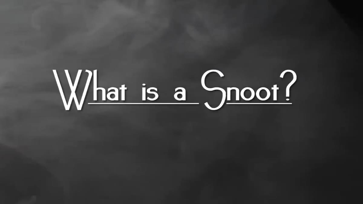 JP holding and describing a snoot modifier on camera