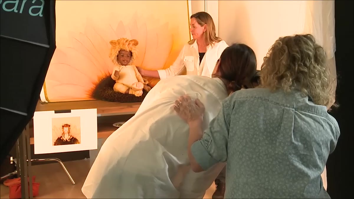 Studio set configured for infant subject with support positions visible