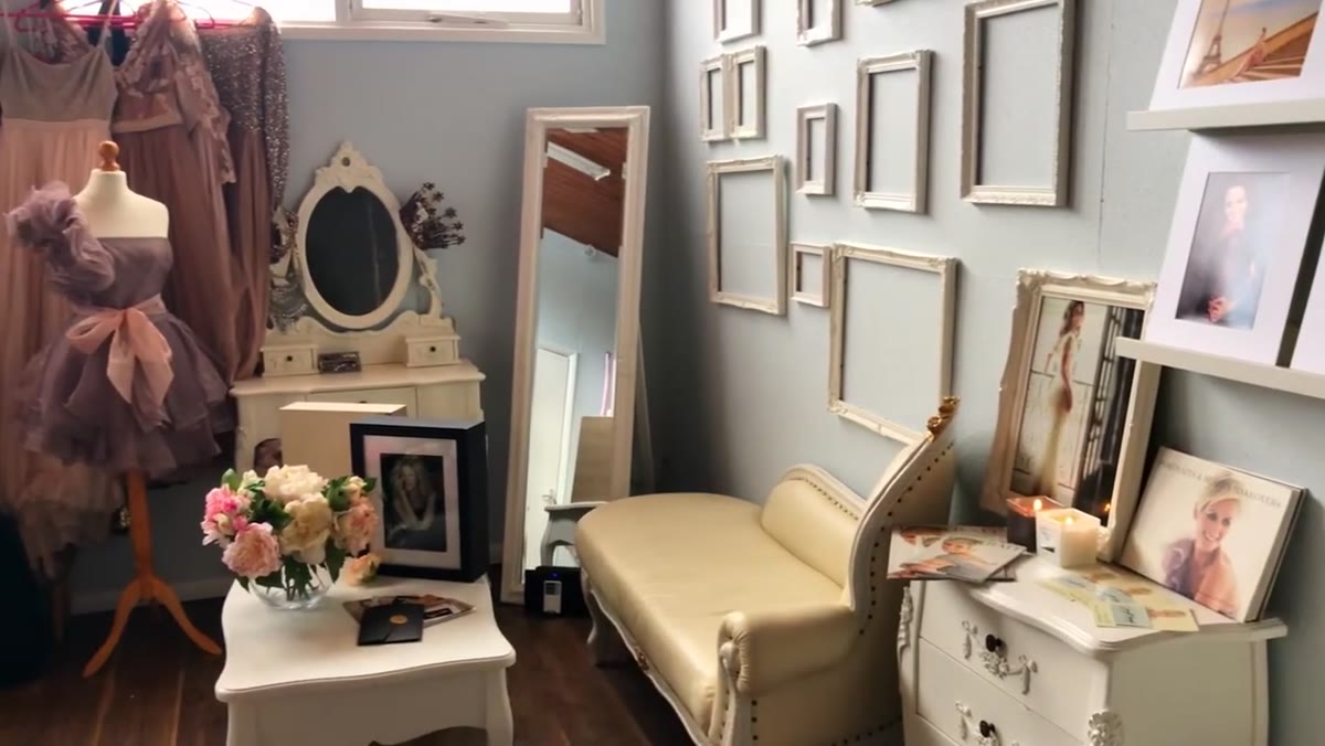 Lenka jokes about having too many clothes in her studio
