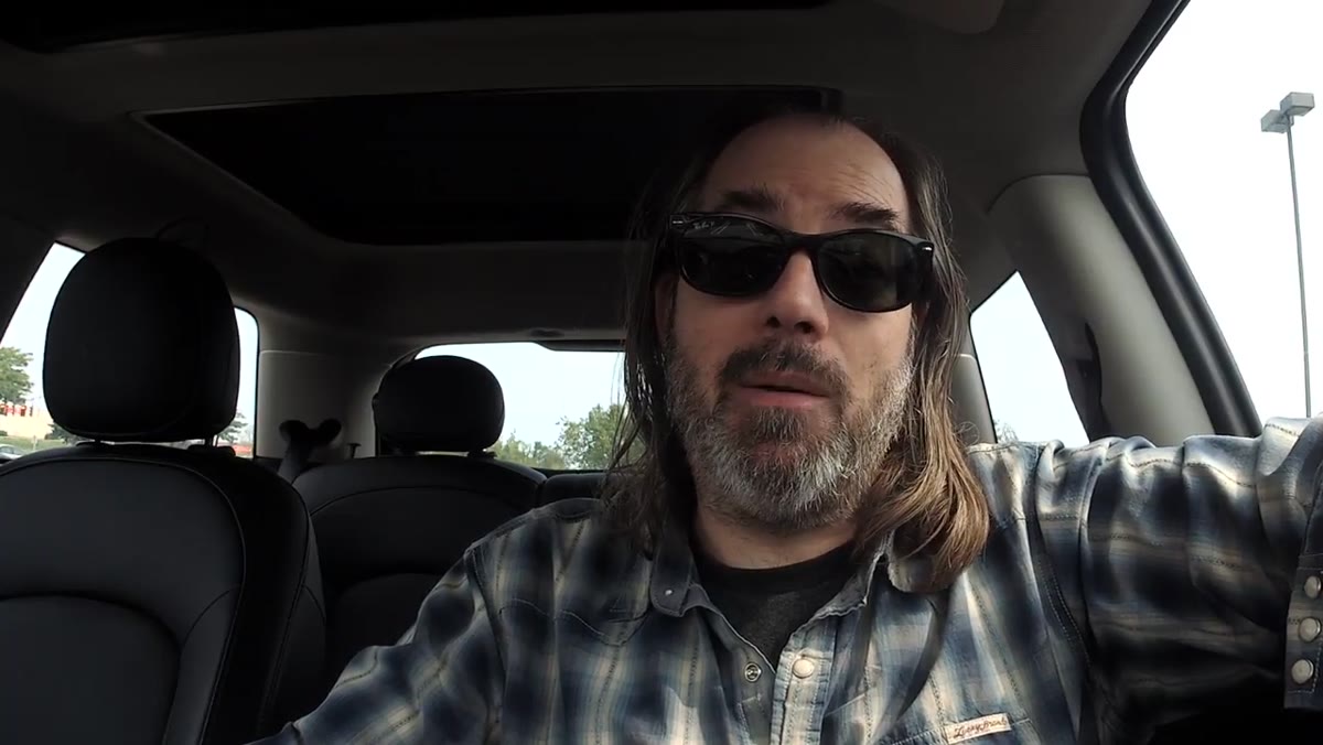 Daniel speaking in car, describing seeing interesting light in everyday situations